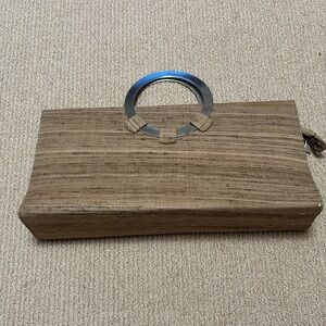 Raw silk purse with metal handles